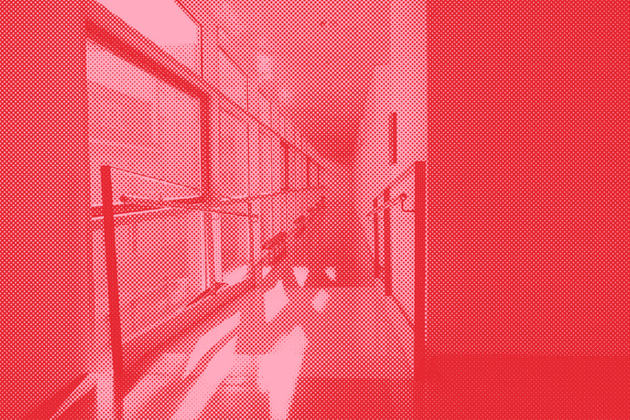 A light-filled corridor with a ramp