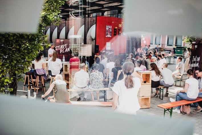 StartPlan presentation in front of a large outdoor audience