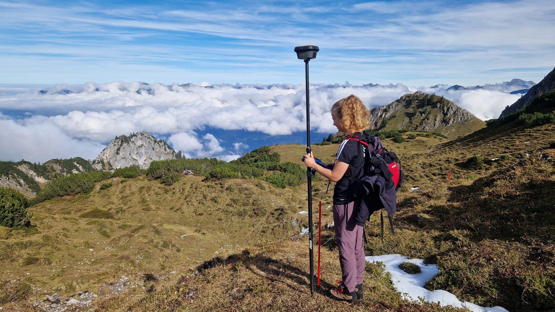 Bei der Absteckung einer Baustraße mit herrlichem Alpenpanorama